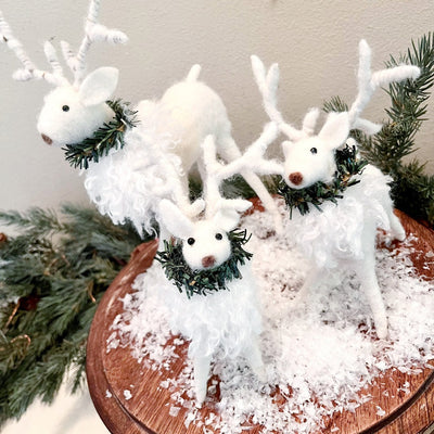 Deer Figure with Wreath Adornment
